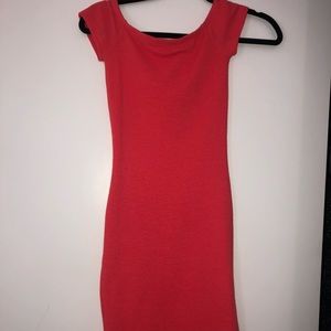 Coral bodycon dress.